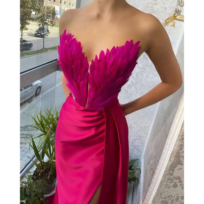 White Satin Gown with Feathers Sweeping the Floor
